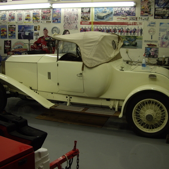 Classic White Roadster and Decorated Garage Walls - chevellejohn from Farmersville, TX