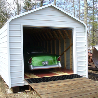 Metal Garage with Green Classic Car Inside - Linda from Charleston, ME