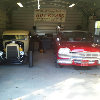 Classic Cars in Metal Garage with Tools and Banner - Eric from Roaring river, NC