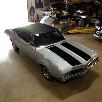 Classic muscle car in organized garage workspace - Severely Twisted from Nokomis, FL