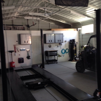 Organized garage with car lift and cabinets - Randy from Pahrump, NV