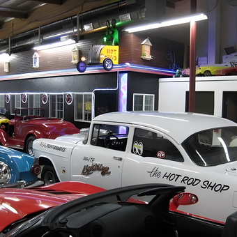 Classic Car Garage with Neon Decor and Wall Art - BEAR from Woodland Hills, CA