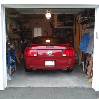 Organized Garage With Red Mustang and Storage Shelves - jost from Danbury, CT