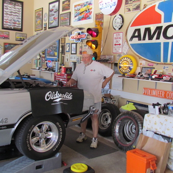 Classic Car Garage with Wall Signs and Neon Decor - Hillbilly from Madison, AL