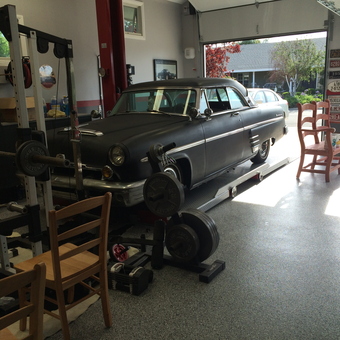 Classic Car with Weight Bench and Garage Decor - Rudy's Garage from Santa Ana, CA