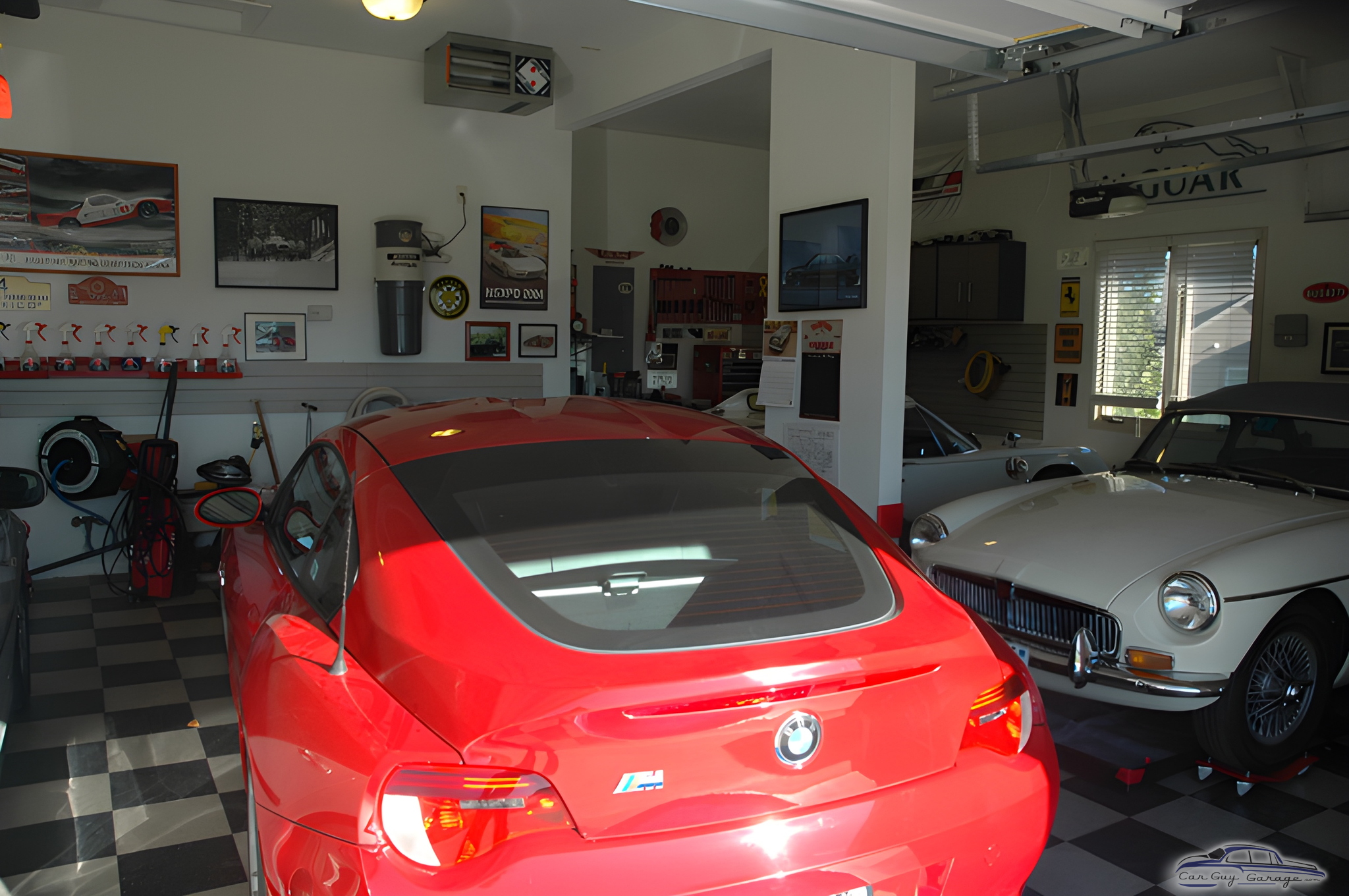 Organized garage with classic cars and wall decor - Rich from Lawrence, KS