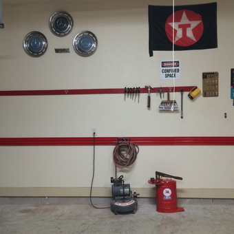 Organized garage wall with tool rack and Texaco flag - Ronnie from Boerne, TX