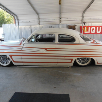 Classic Custom Car with Striped Paint in Covered Garage - Mercman