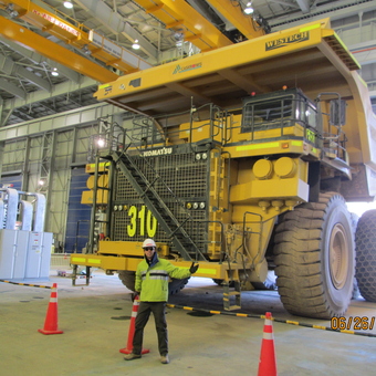 Massive Komatsu Mining Dump Truck in Large Garage - Redfish from Greer, SC