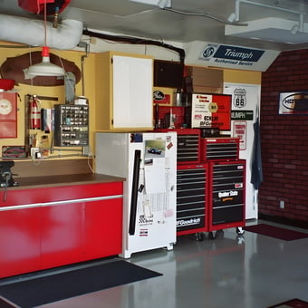 Organized Garage with Red Tool Cabinets and Signs - West Coast Bernie from Orange, CA
