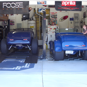 Custom blue hot rods, car lift, banners, and storage - Randy from Livermore, CA