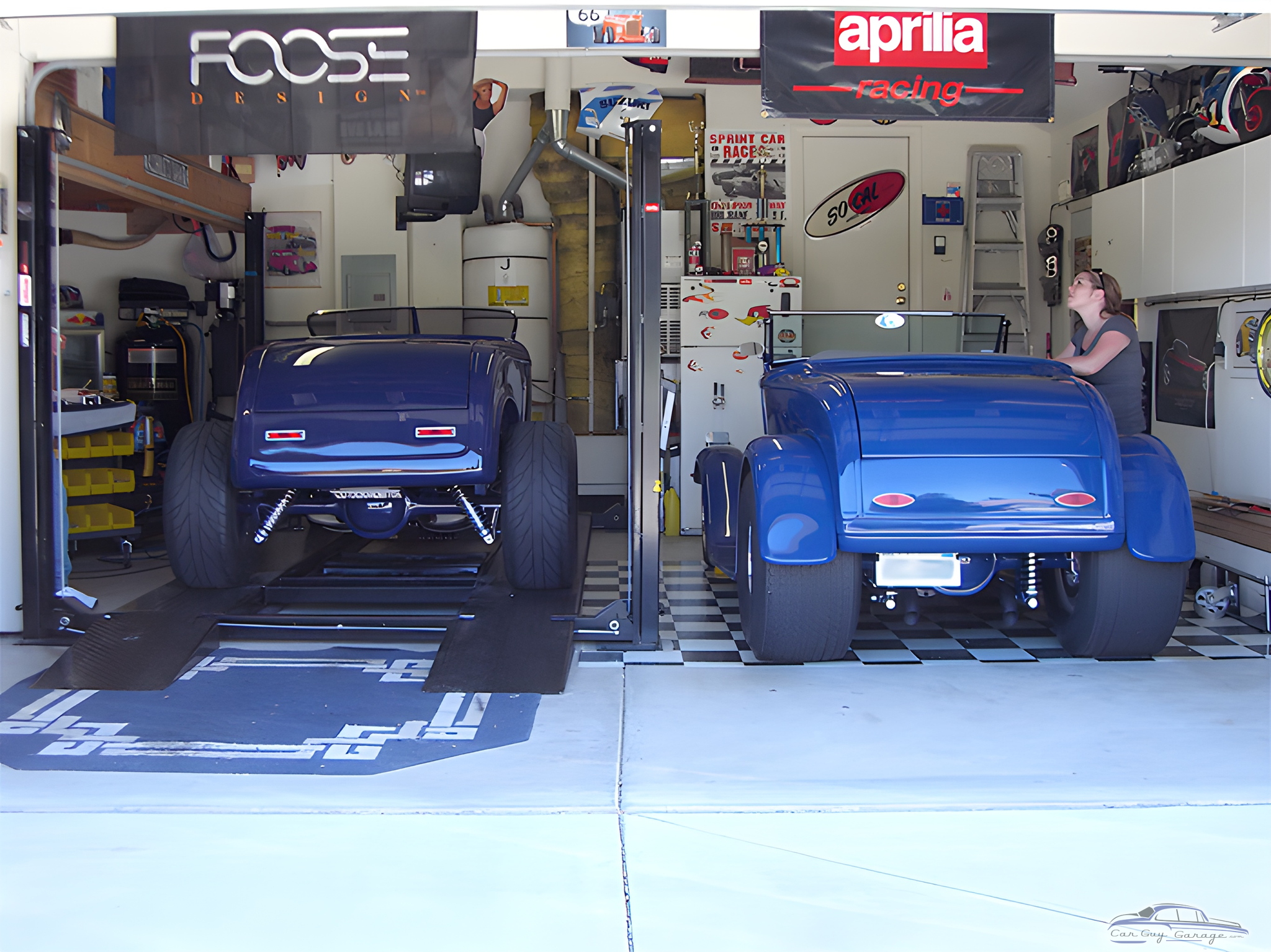 Custom blue hot rods, car lift, banners, and storage - Randy from Livermore, CA