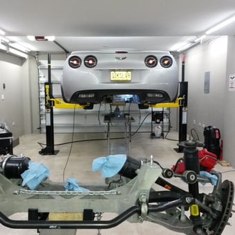 Modern garage with car lift and Corvette - Sammy from Grand Cayman, Cayman Islands