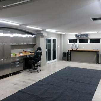 Modern garage with stainless cabinets and workbench - Sammy from Grand Cayman, Cayman Islands