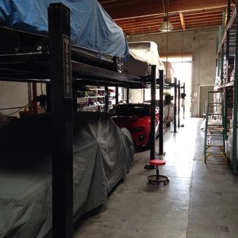 Garage with Car Lifts, Covers, and Rolling Stool - Rootyrbeer from Salinas, CA