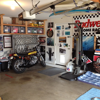Organized garage with Kawasaki motorcycle and gym equipment - fastmike from Huntington Beach, CA