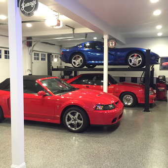 Showroom Garage with Car Lift and Mustangs - LBC from Mount Airy, MD