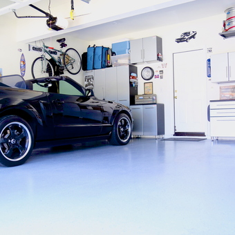 Organized garage with cabinets and black sports car - Mike from Moorpark, CA