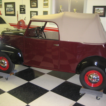 Classic car on wheel dollies in checkered garage - Bill from HOFFMAN ESTATES, IL