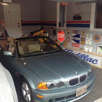 Garage with BMW Convertible and Vintage Signs - Tom from Woodstock Ontario Canada, MI