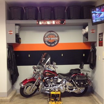 Harley-themed garage with motorcycle, storage bins, tool chest - Harley Bob from Lake Saint Louis, MO