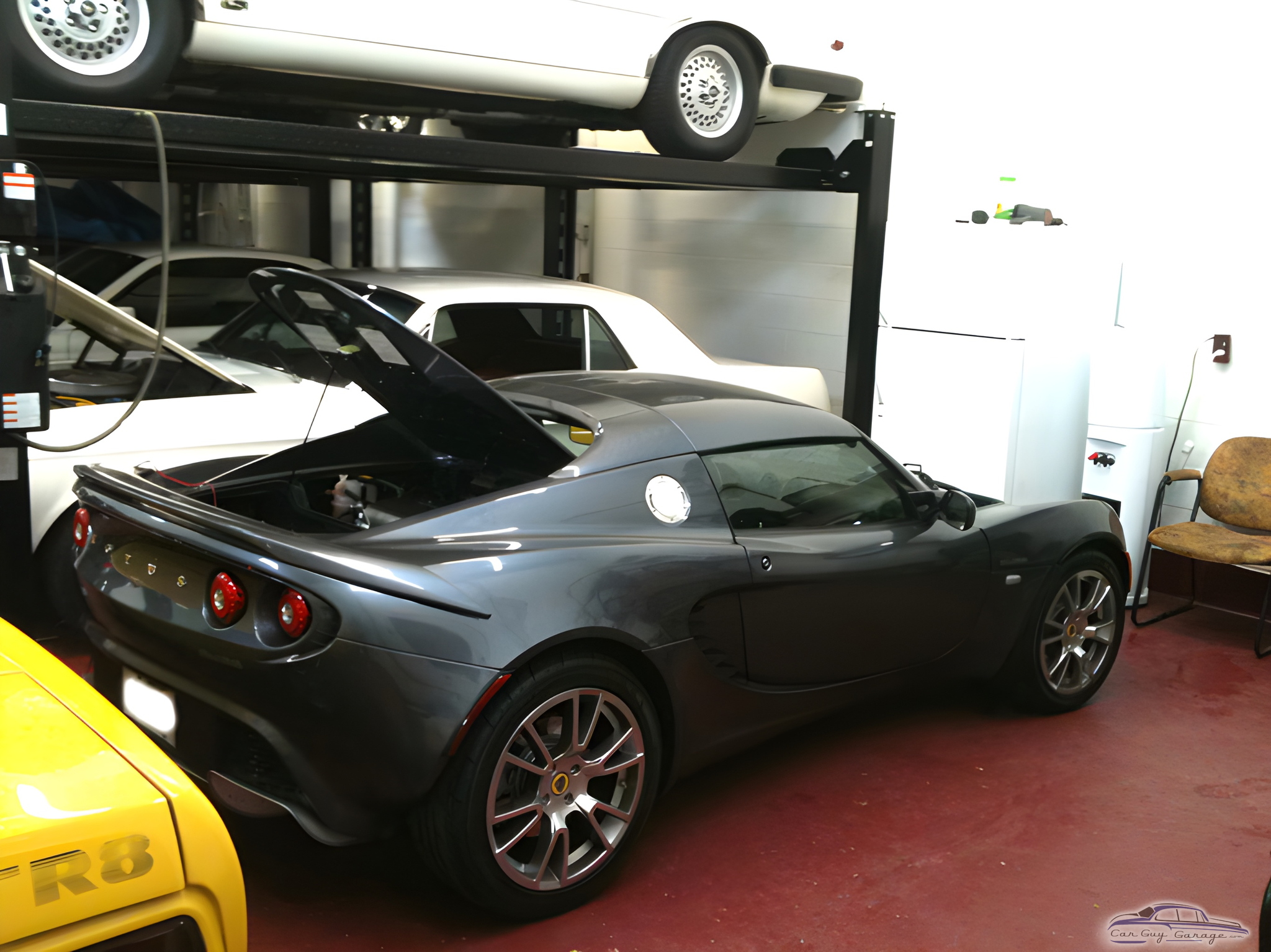 Home garage with car lift and sports cars - Gino from Montreal, Quebec