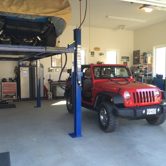 Spacious garage with car lift, tool chests, and Jeep - Kory from Zion Crossroads, VA