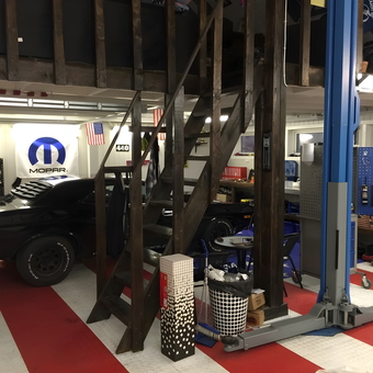 Classic car garage with car lift and workspace - Geir from Norway