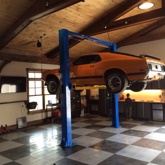 Garage with Car Lift, Tool Cabinets, and Checkered Floor - Mike