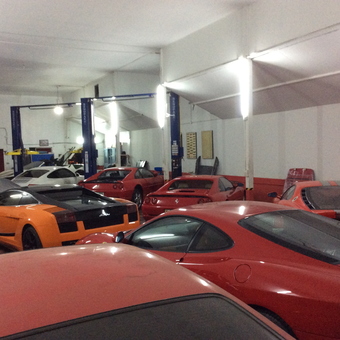 Exotic Cars and Car Lifts in Spacious Garage - Buono Auto Clinic from Bangkok Thailand