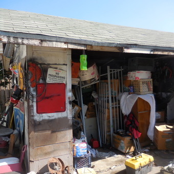 Outdoor garage with tools, storage boxes, and signs - MOPAR BOB from SAN JOSE, CA