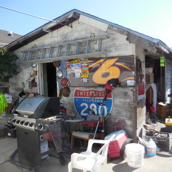 Rustic garage with racing signs, grill, and storage - MOPAR BOB from SAN JOSE, CA