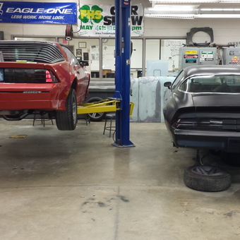 Garage With Car Lift and Two Camaros - Bob from Kaukauna, WI