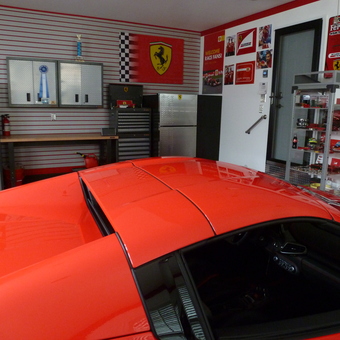 Ferrari-Themed Garage with Metal Cabinets and Wall Decor - Ferrarimike from Chalfont, Pa