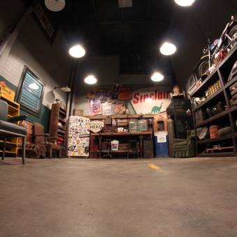Vintage Garage with Sinclair Sign and Motorcycle Parts - Workshop Hero from Howell, MI