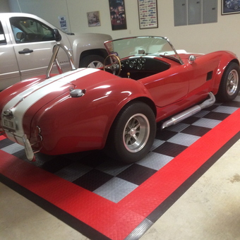 Classic Car Display on Checkered Garage Floor Tiles - Herb from Montgomery, TX