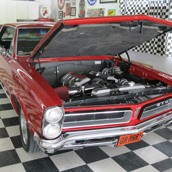 Classic Red Pontiac GTO in Checkered Garage - Mike from Topeka, KS