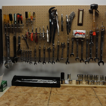 Organized pegboard tool wall with wrenches and sockets - Doug from Kasson, MN