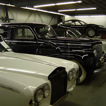 Classic Cars in Well-Lit Garage with Tools - Custom Auto Body from San Diego, CA