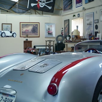 Classic Car Garage Decor with Racing Memorabilia - Jacques from Harper, Texas