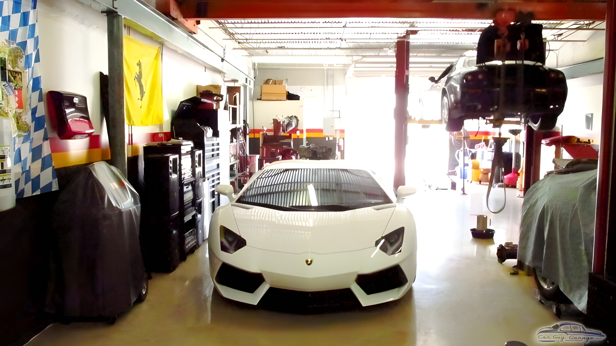 Exotic Car Garage with Tool Cabinets and Lift - F50 Motorsports from Pompano Beach, FL