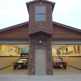 Classic car garage with wall signs and collectibles - MustangGuy from Medina, Oh