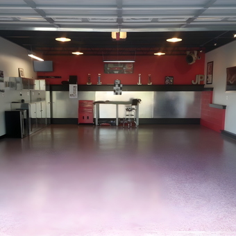 Organized garage with storage cabinets and bar area - John Putzier from Prospect, PA