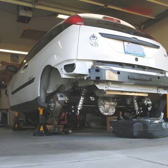 Garage with Car on Jack Stands and Tools - Charpett from Springfield, Missouri