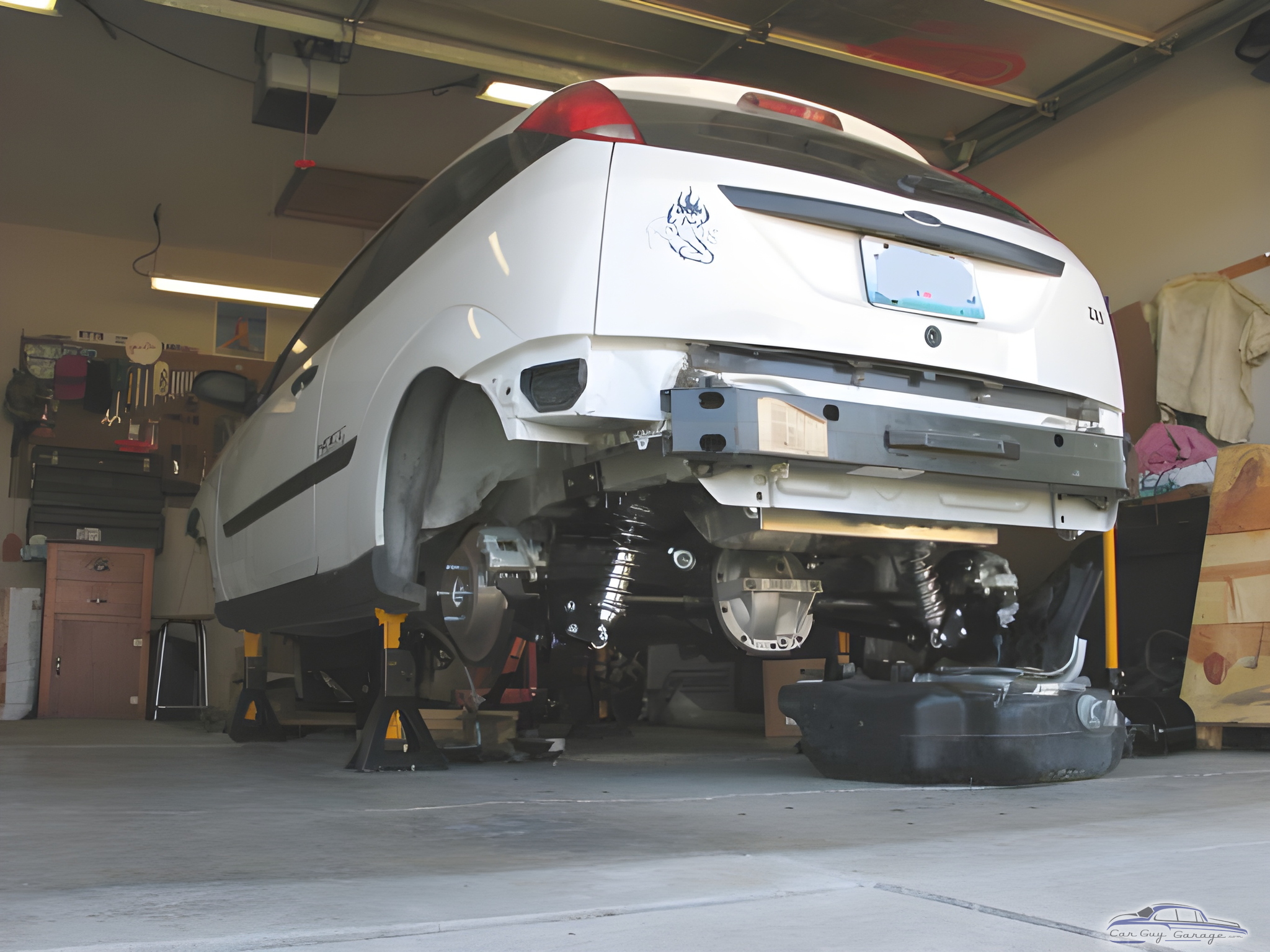 Garage with Car on Jack Stands and Tools - Charpett from Springfield, Missouri