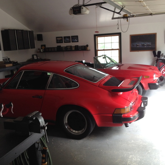 Garage with Red Classic Cars and Storage Cabinets - KILRWAIL from Perth, ON