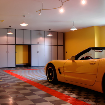 Modern garage with checkered flooring and cabinets - Ian from Denver, CO