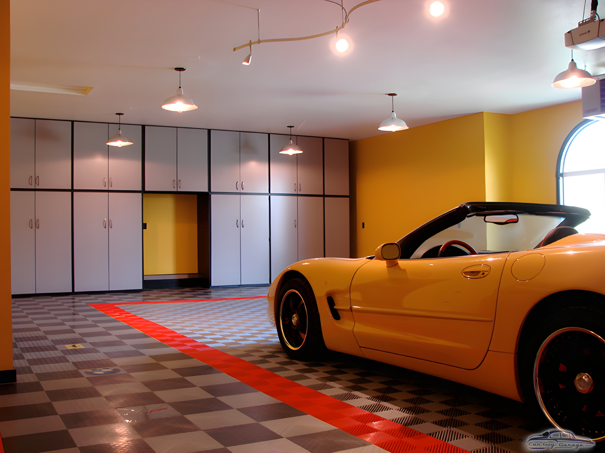 Modern garage with checkered flooring and cabinets - Ian from Denver, CO