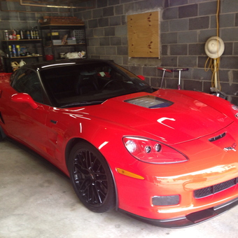 Red Corvette in Organized Garage with Shelving - Joseph from King Of Prussia, Pa