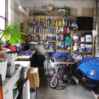 Organized garage with shelves, workbenches, car and tools - Robin from Edinburgh, Midlothian